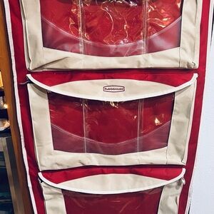 Rubbermaid Red and Tan Hanging Storage dog carrier.